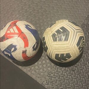 Two Soccer Match Balls.